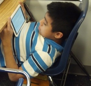 Student reading on Nook